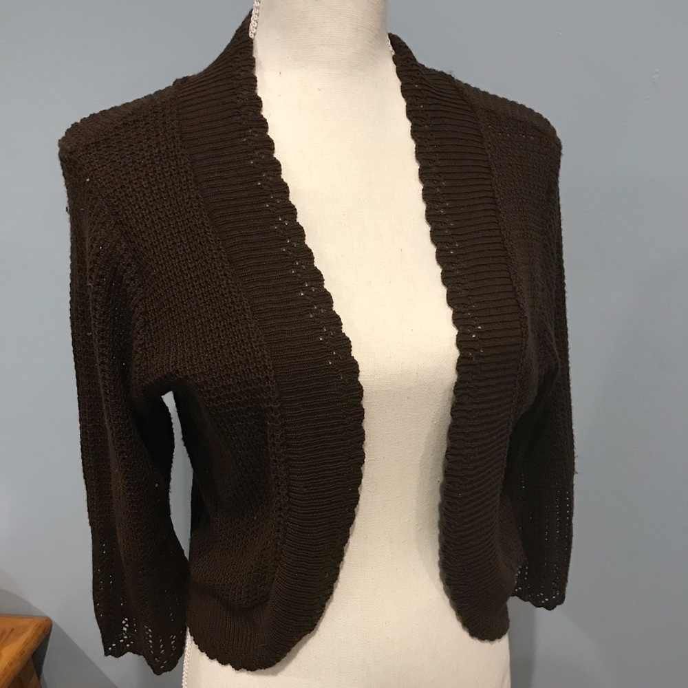 Kim Rogers dark brown shrug.